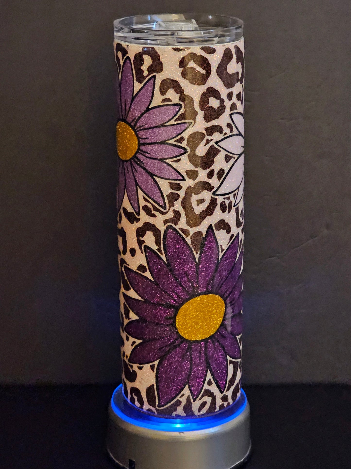 Purple flower with leopard background