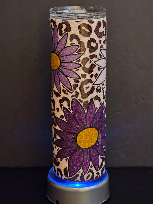 Purple flower with leopard background